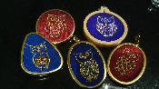 Owl design brooches and pendants