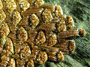 Pine cone detail on moss green silk